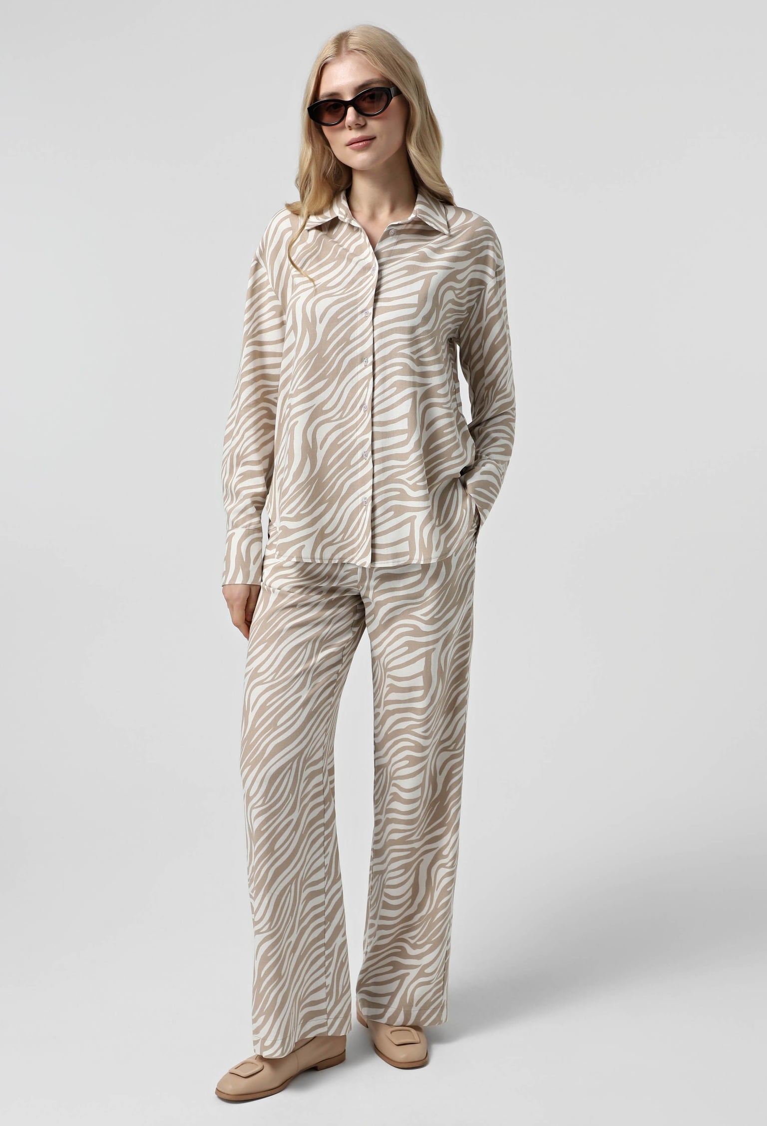 Брюки 9901-2 бежевий, принт льон 42(р)